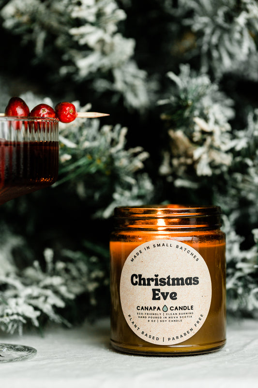 Christmas Eve 9oz Soy Candle made in Canada by Canapa Candle in Louisbourg, Cape Breton Island, Nova Scotia - Vegan, Paraben and Phthalate free - Smells like:  Vanilla Cream, Cinnamon, Sugar, Smoke, Sweet Peppermint, Tobacco