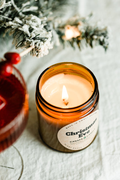 Christmas Eve 9oz Soy Candle made in Canada by Canapa Candle in Louisbourg, Cape Breton Island, Nova Scotia - Vegan, Paraben and Phthalate free - Smells like:  Vanilla Cream, Cinnamon, Sugar, Smoke, Sweet Peppermint, Tobacco